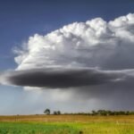 An image showcasing what is a cloudburst, and heavy rain causing flooding and cloudburst.